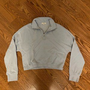 Cropped baby blue quarter zip sweatshirt